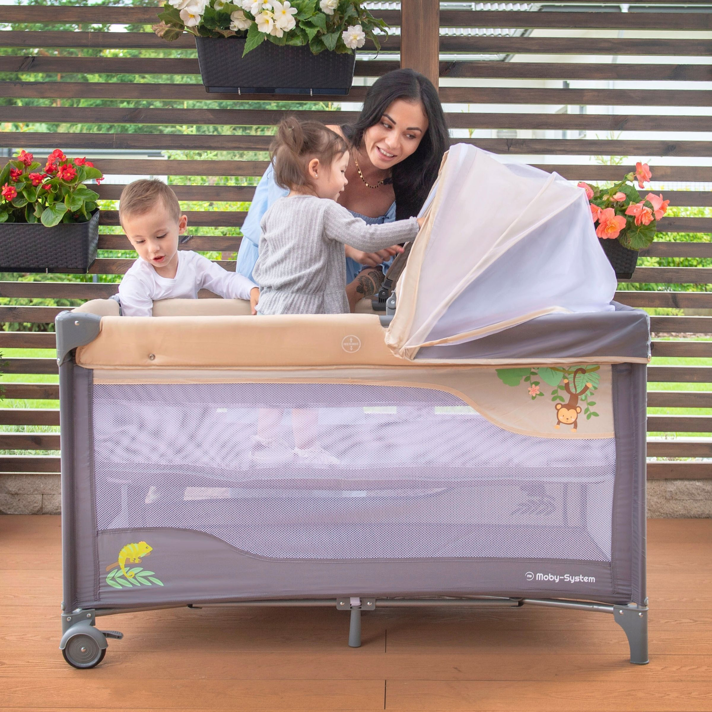 Ceļojumu gultiņa 0 - 36 m ar pārtinamo galdu + Moby-System HUXLEY sētiņa